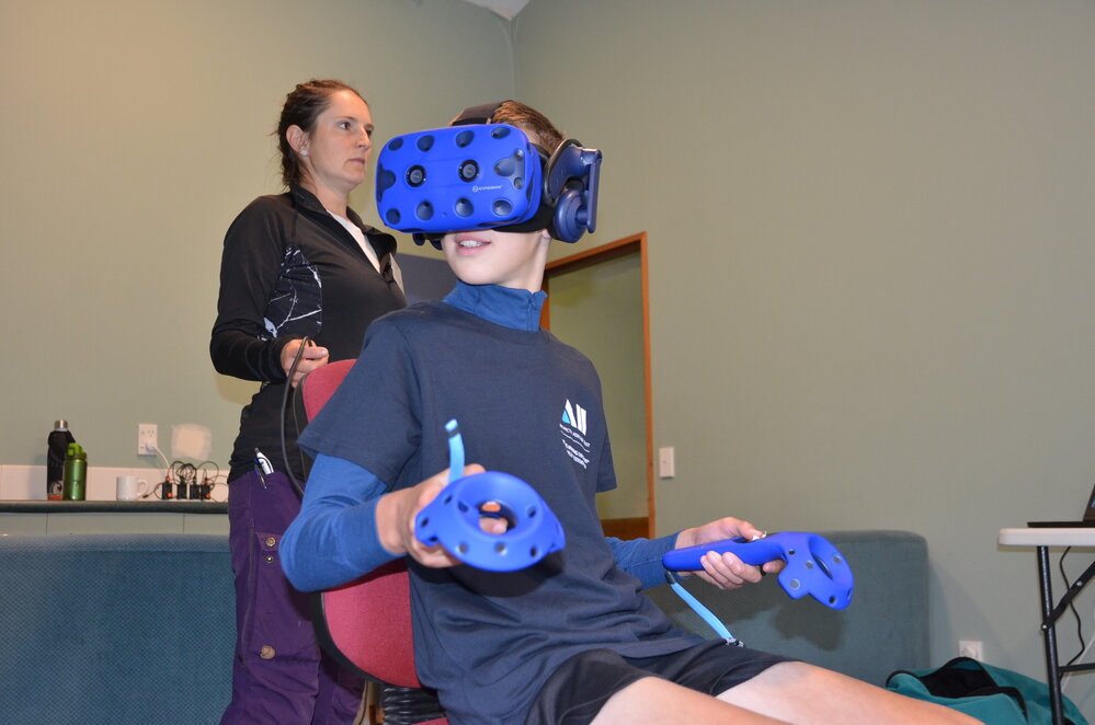 Trying out the Virtual Reality experience of Hillary's Hut (007)