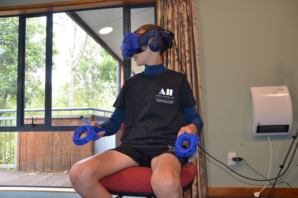 Trying out the Virtual Reality experience of Hillary's Hut (010)