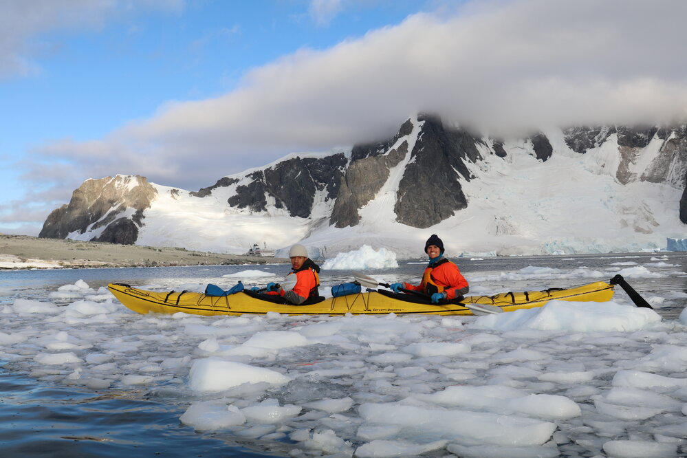 Inspiring explorers A'aifou Kaufusi-Potemani and Owain John kayaking through brash ice