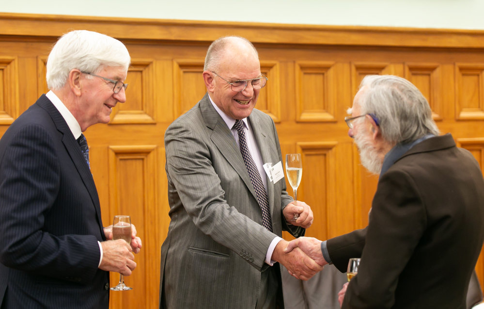 Richard McElrea former AHT Chair and Former AHT Chairman David Crerar greeting geologist Arnold Heine