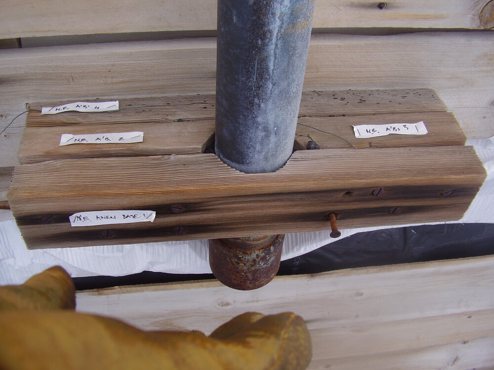 Supporting bracket for pipe on east elevation