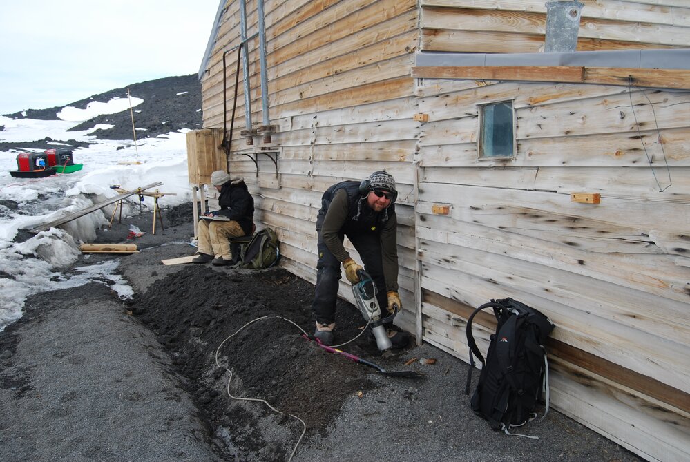 Prepping for installing waterproof membrane, east wall of Scott's 'Terra Nova' Hut 