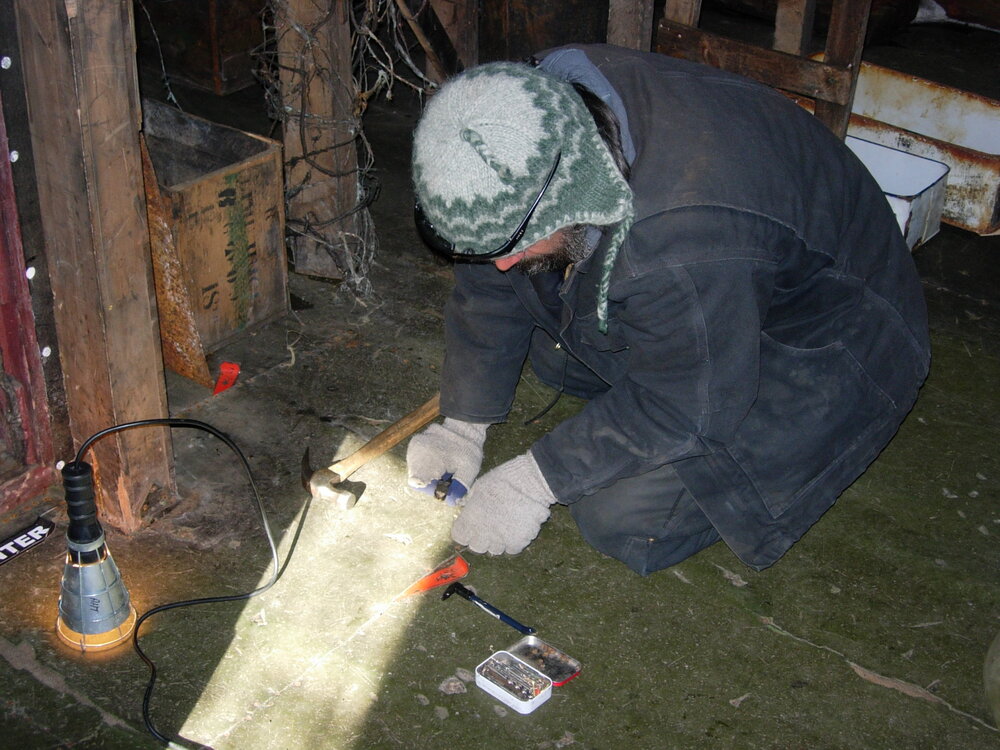 2007 Gordon Macdonald investigating moisture, Cape Evans