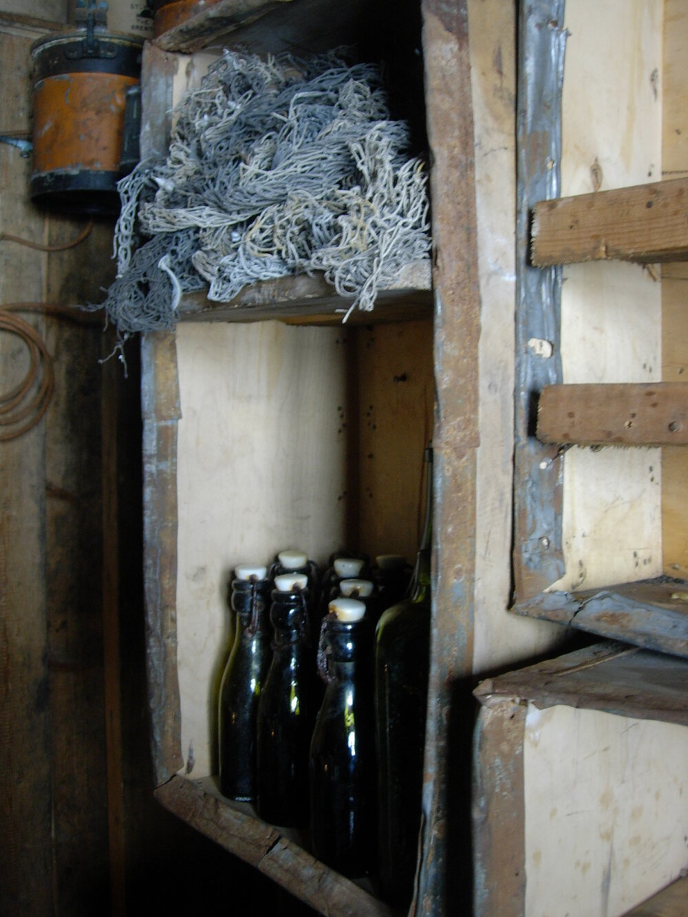 2007 Artefacts on shelves inside Shackleton's 'Nimrod' hut, Cape Royds