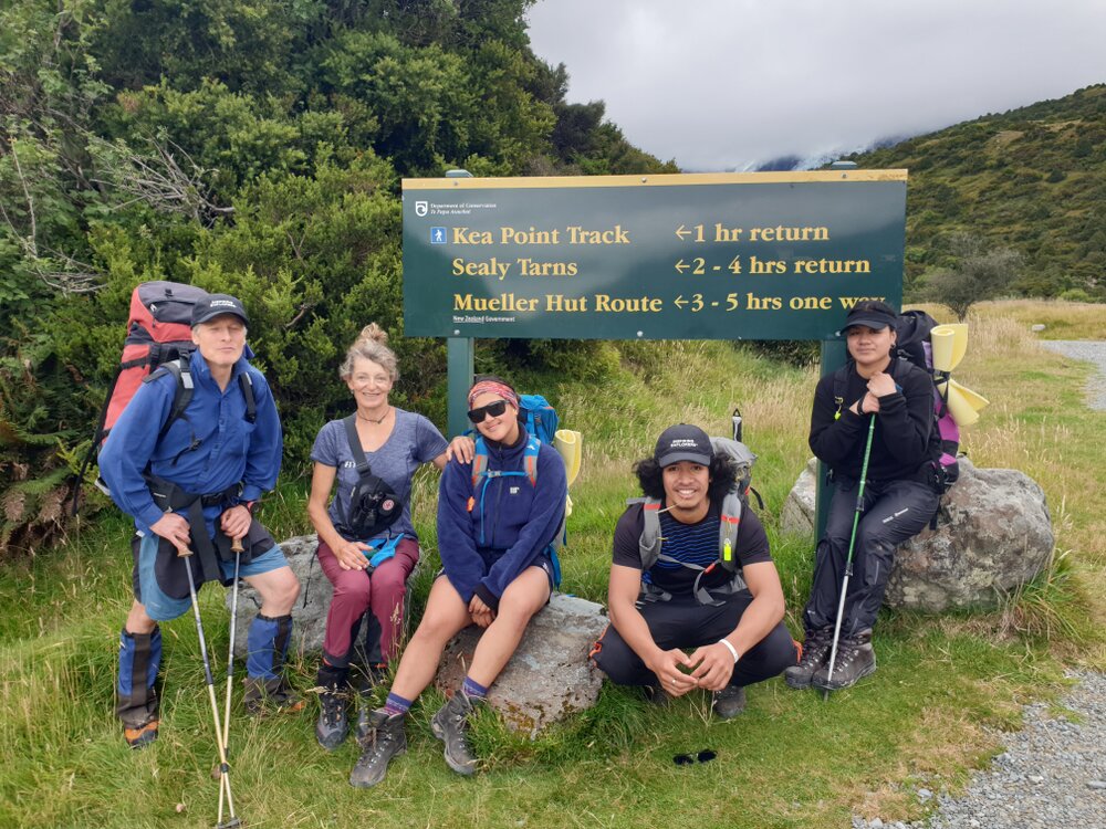 Group photo at Department of Conservation sign (001)