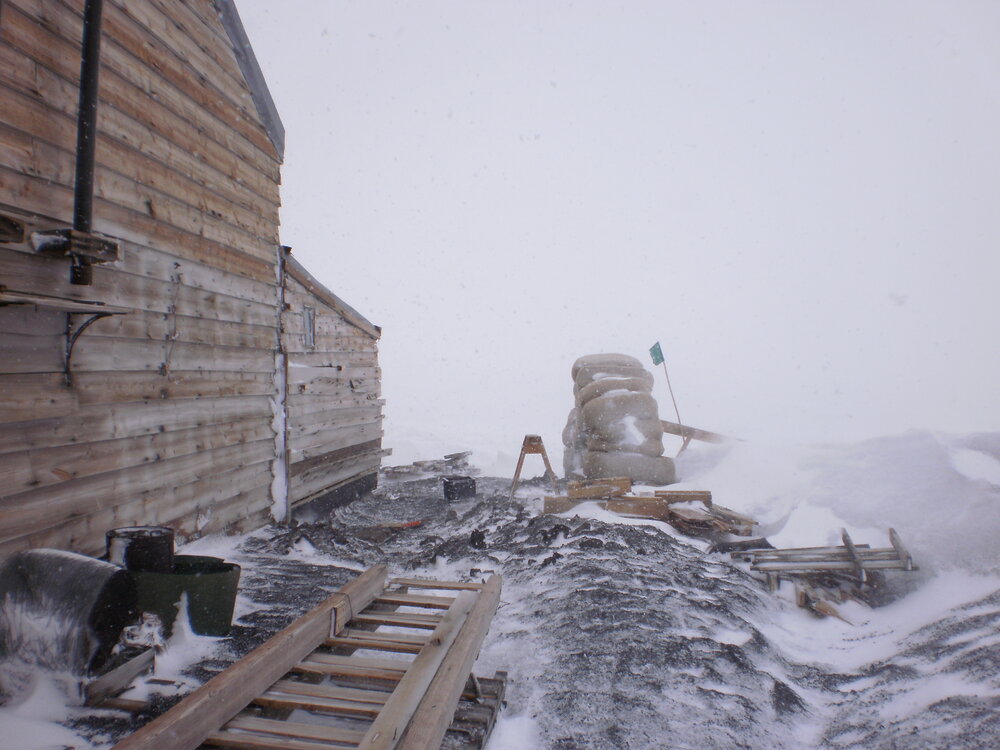 2009-10 Scott's 'Terra Nova' hut and fodder bales in snow