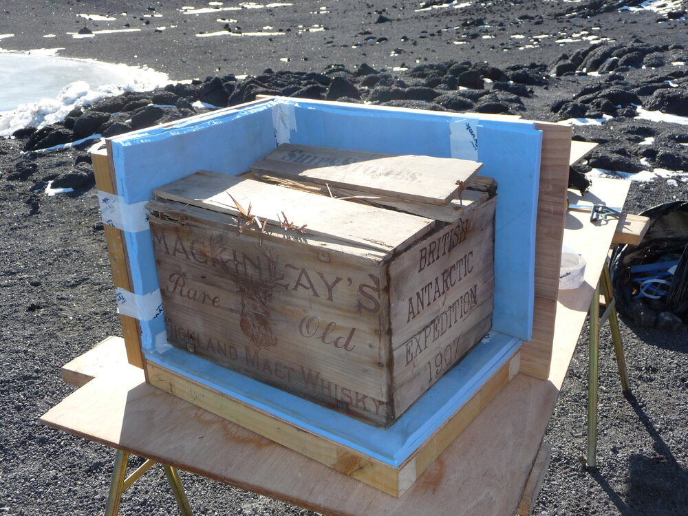 2009-10 Mackinlay's whisky crate in packing box, Shackleton's 'Nimrod' hut, Cape Royds