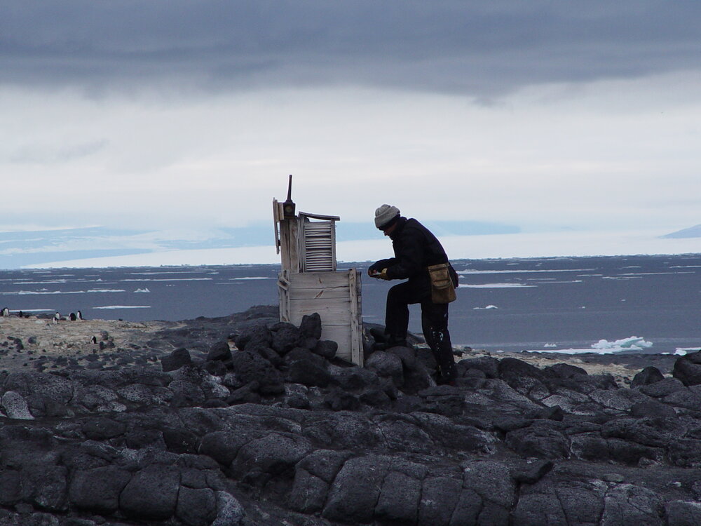 2006-07 Charley Brentnall with the Meteorological screen at Cape Royds