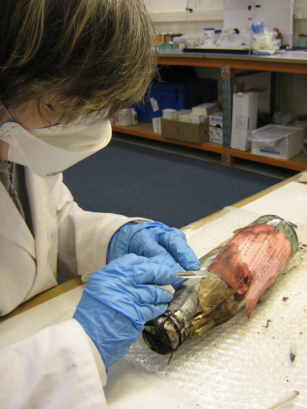 2007 Conservator Fiona Cahill removing a wrapper