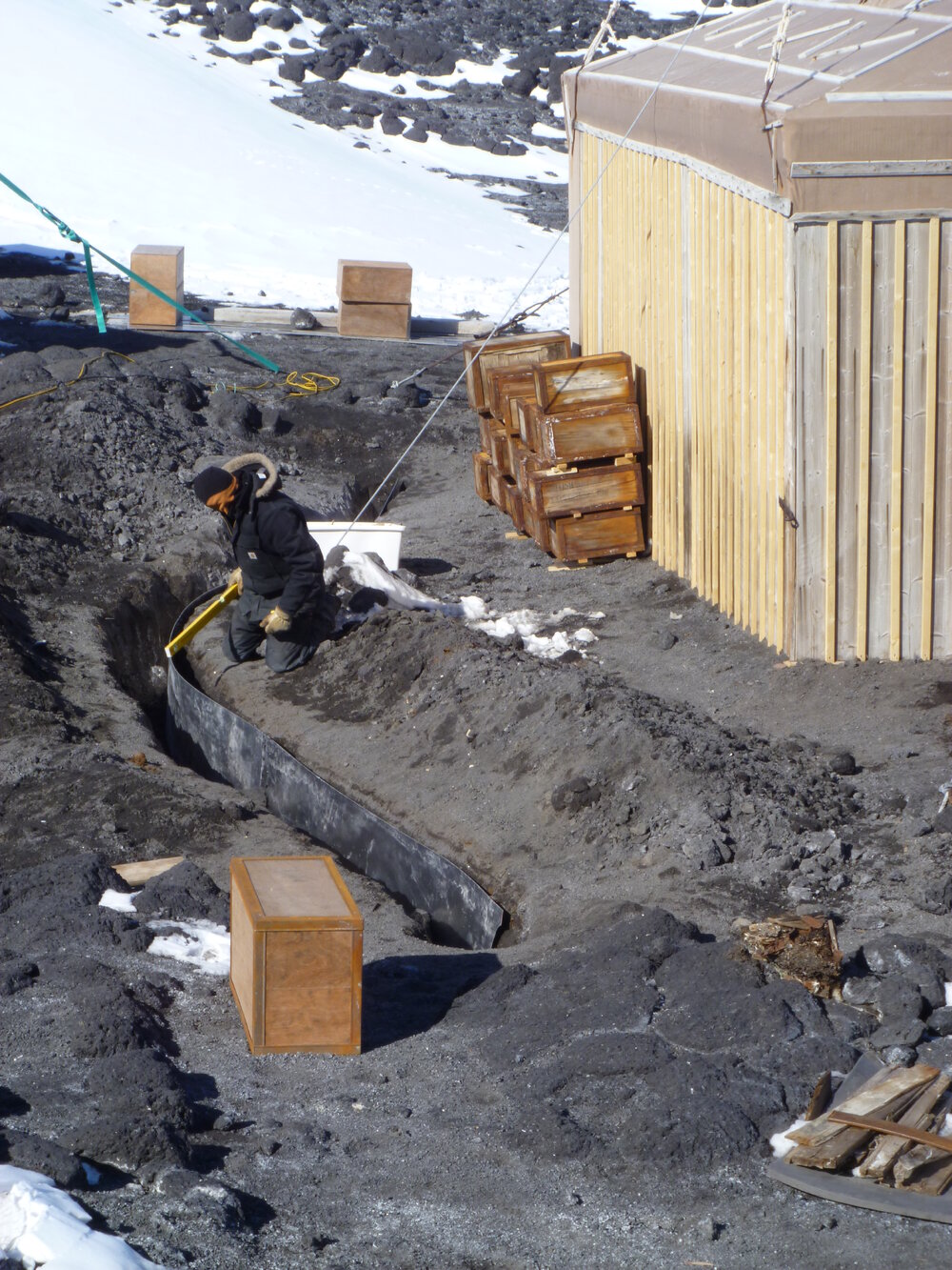 2010-11 John Taylor checking the level of the deflection dam, Cape Royds