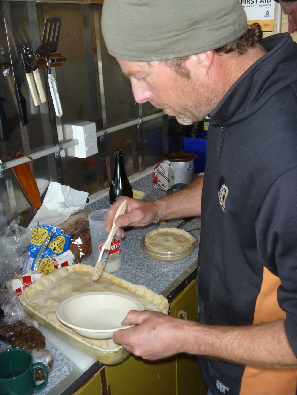 2010-11 Jaime Ward making a pie at field camp