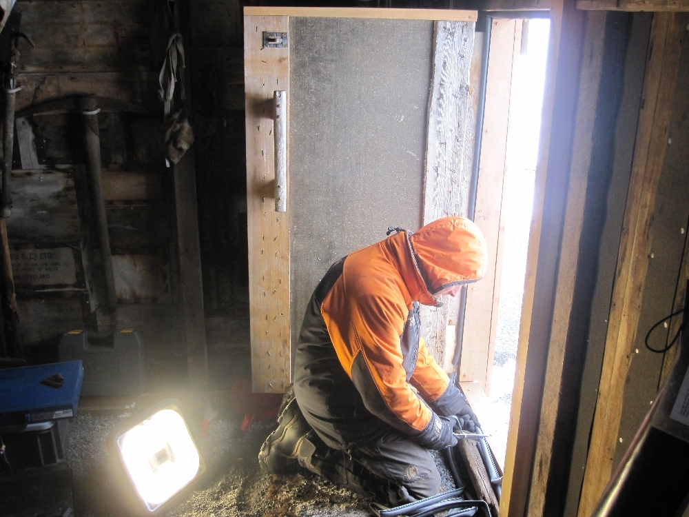 2010-11 Conservators at work, Jaime Ward working at Scott's 'Terra Nova' hut