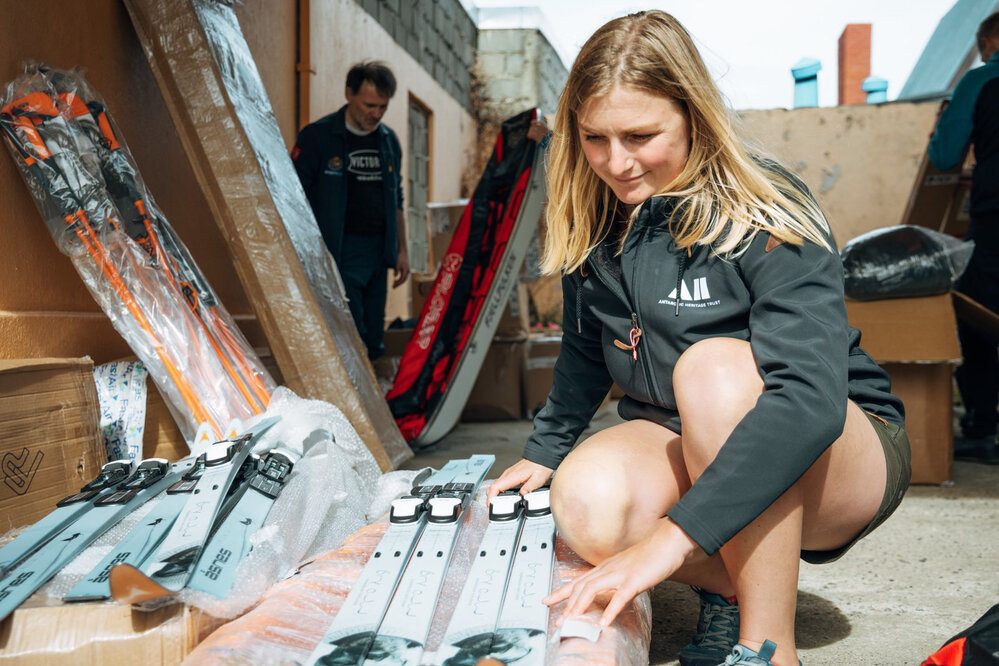 Laura Andrews with skis during expedition preparations