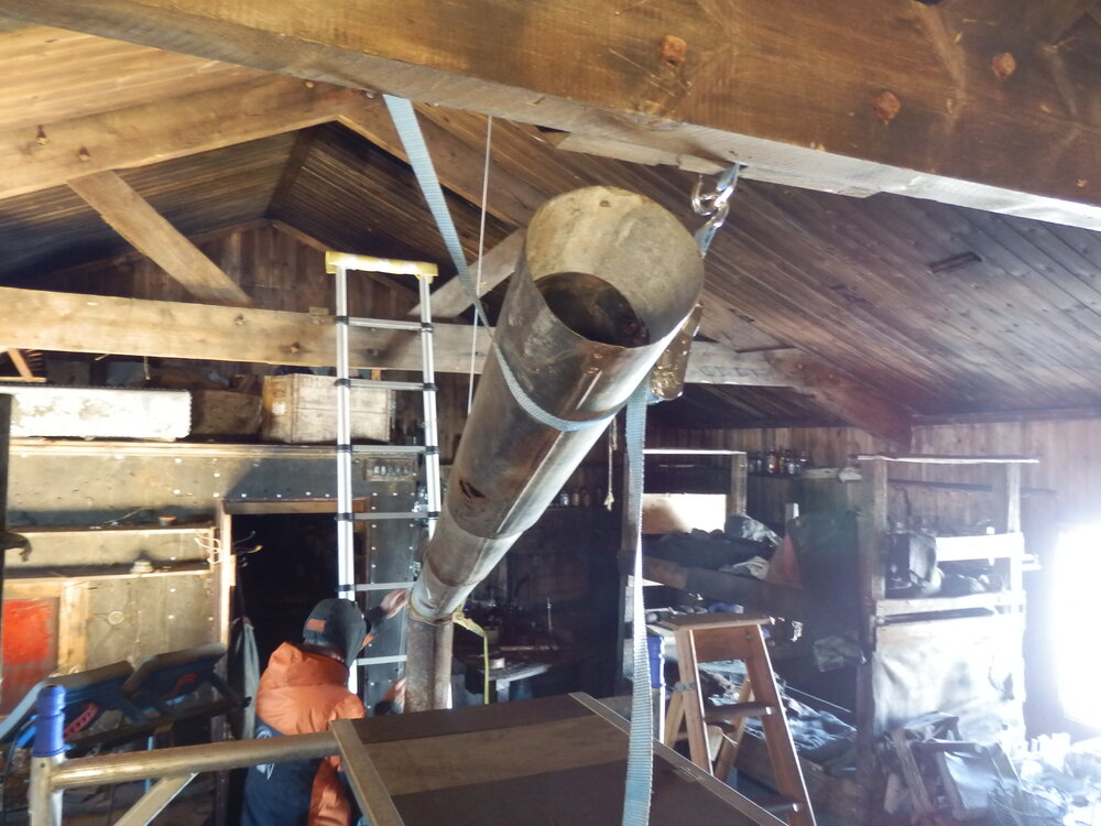Flue installation in Scott's 'Terra Nova' Hut 