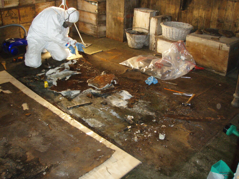 Asbestos removal, stove in Scott's 'Terra Nova' Hut 