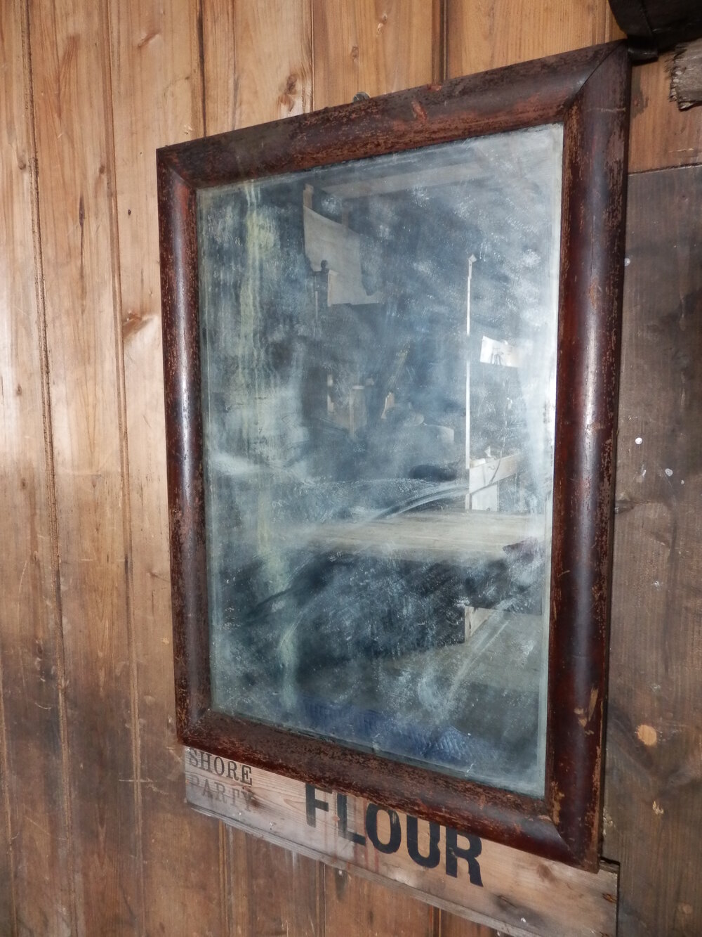 Wardroom mirror repair, Scott's 'Terra Nova' Hut