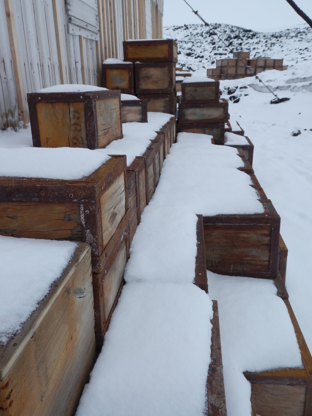 Snow build-up on boxes, Shackleton's 'Nimrod' Hut 