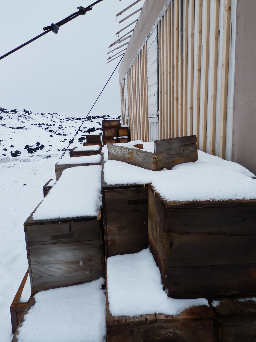 Snow build-up on boxes, Shackleton's 'Nimrod' Hut (003)