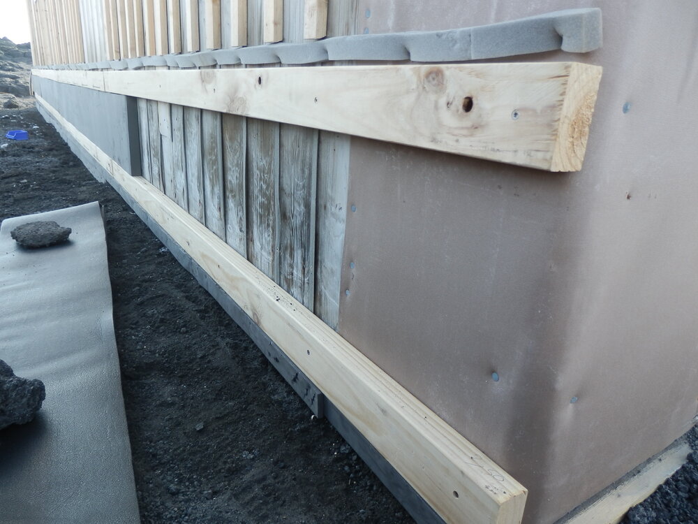 Installing foam and pine rails, Shackleton's 'Nimrod' Hut