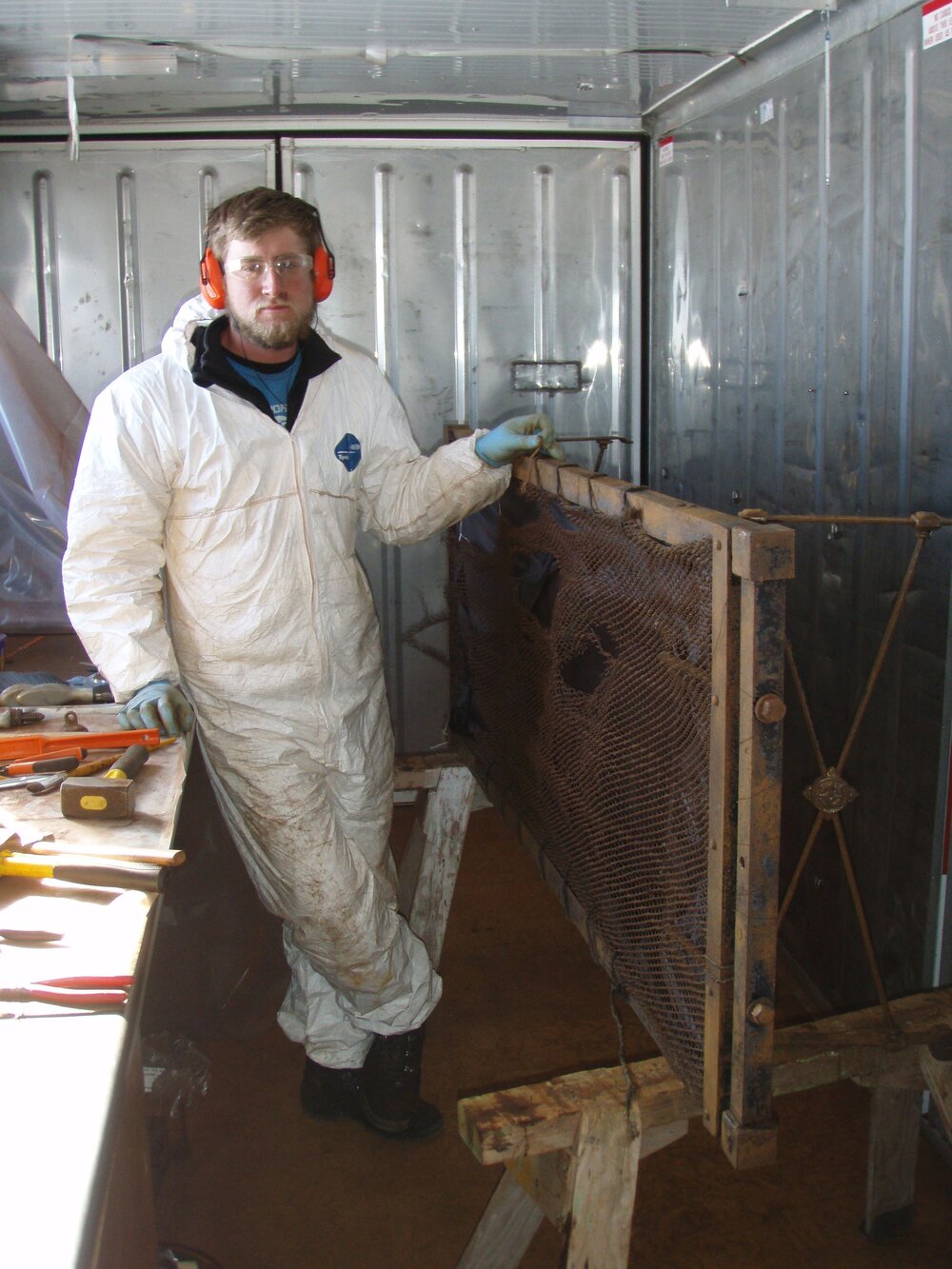 John Evans working on bed frames