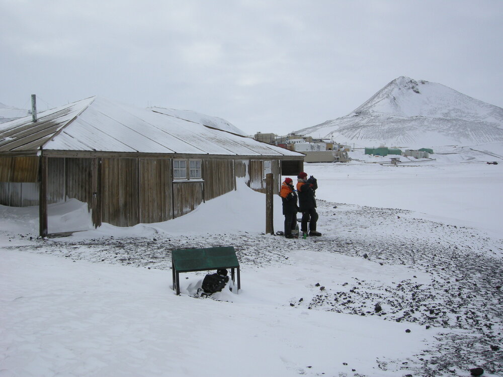2013-14 Lizzie Meek and Josiah Wagener outside Scott's 'Discovery' hut, Hut Point (001)