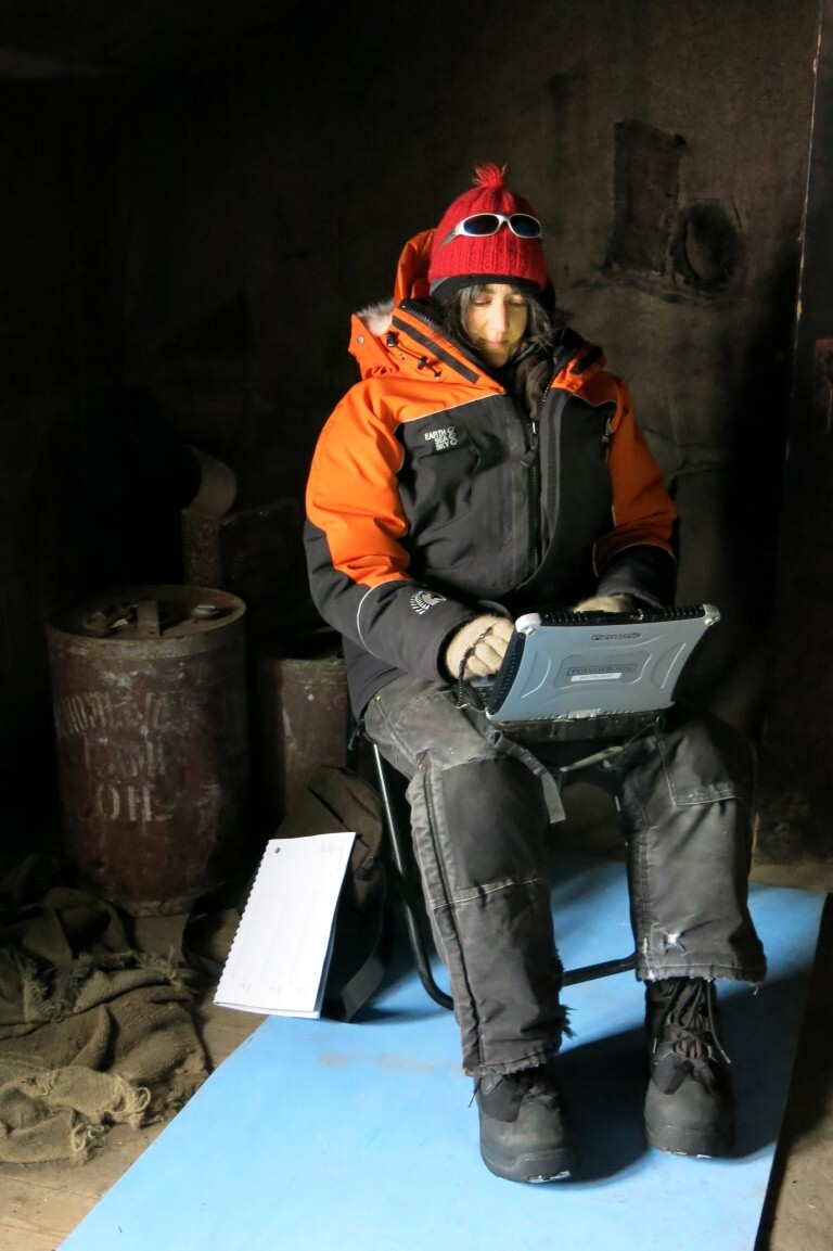 2013-14 Lizzie Meek working inside Scott's 'Discovery' hut, Hut Point