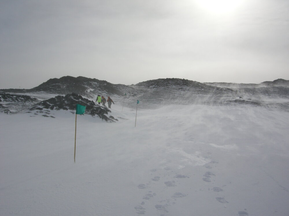 2013-14 AHT team following the wayfinding flags, Cape Royds