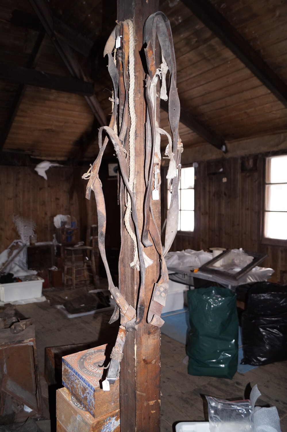 2013-14 Location image, artefacts on post, Scott's 'Discovery' hut, Hut Point (003)