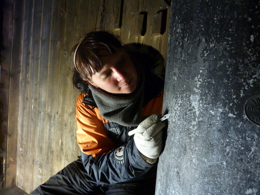 2009-10 AHT's Fran Clarke treating acetylene generator, Scott's 'Terra Nova' hut