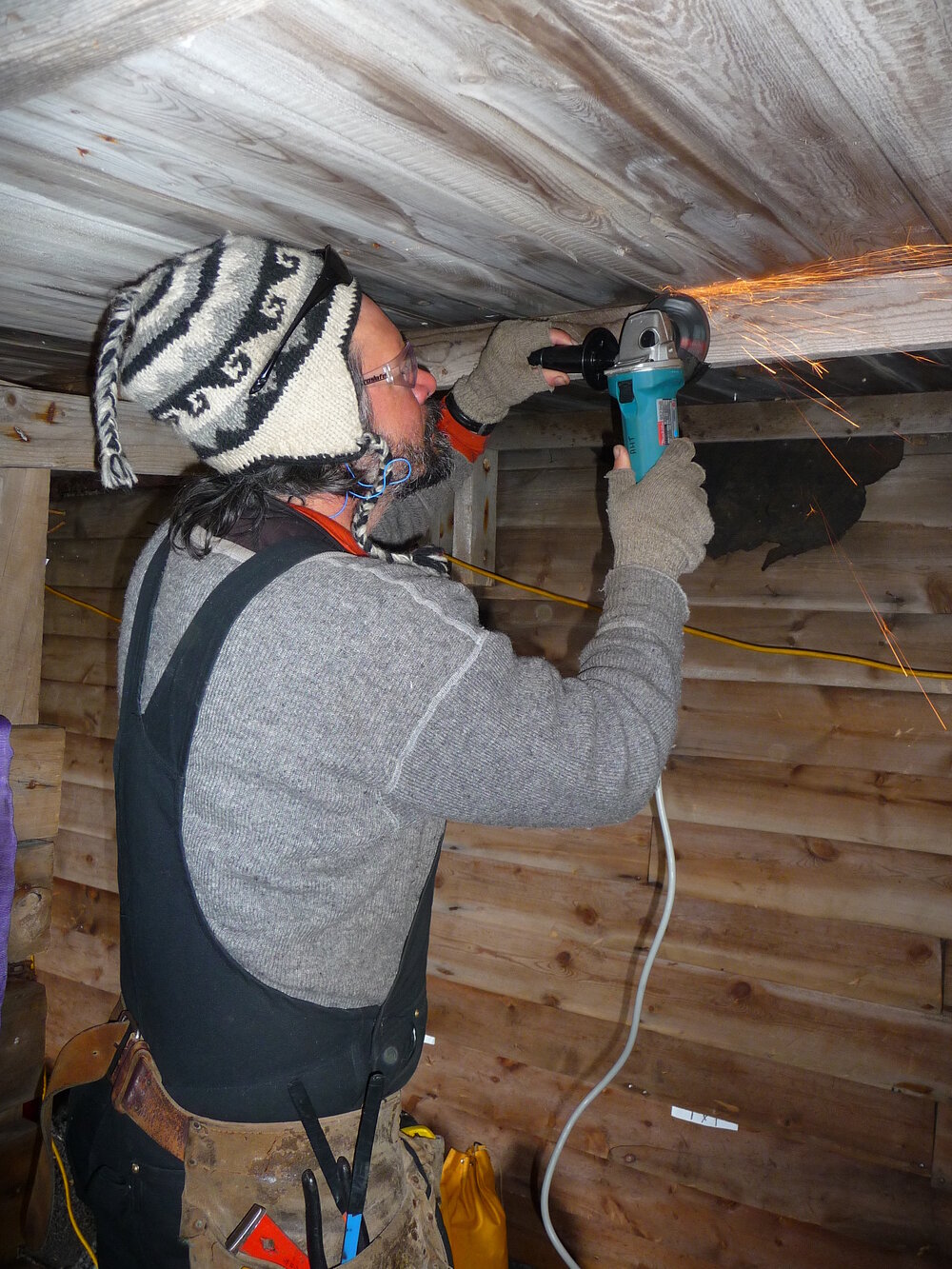 2009-10 AHT's Gord Macdonald working inside Stables, Scott's 'Terra Nova' hut