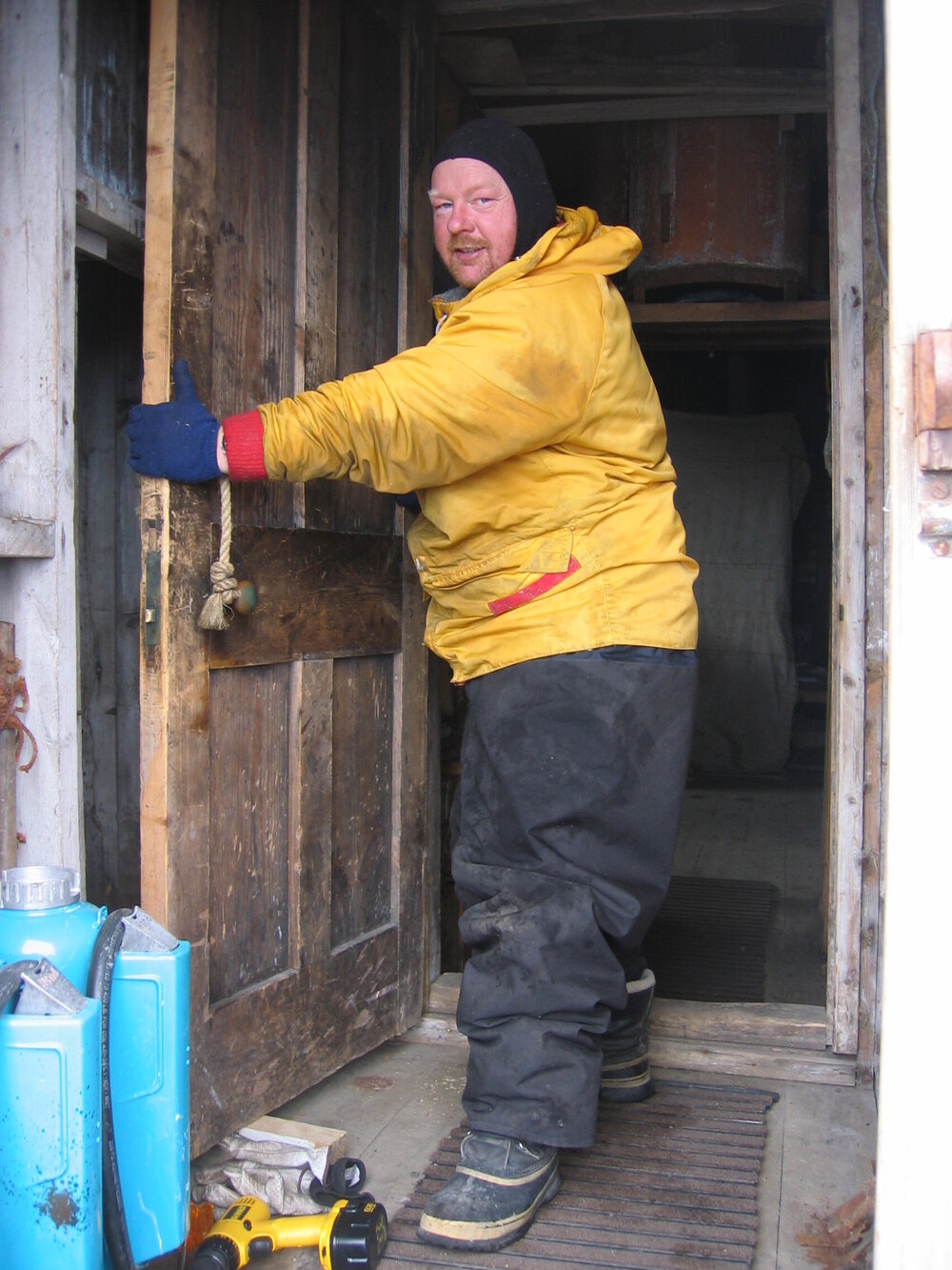 2005-06 Paul Terry rehanging the door of Shackleton's 'Nimrod' hut, Cape Royds