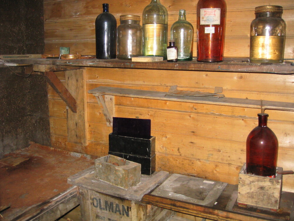 2005 Artefacts on a shelf inside Shackleton's 'Nimrod' hut