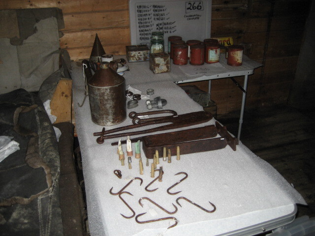 2006 Artefacts on a table inside Shackleton's 'Nimrod' hut, Cape Royds (001)