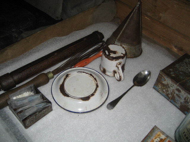 2006 Artefacts on a table inside Shackleton's 'Nimrod' hut, Cape Royds (002)