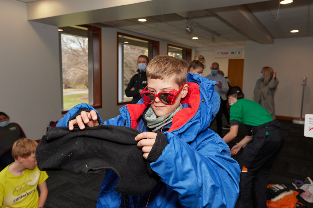 2022 Young Inspiring Explorers trying on Antarctic clothing at Canterbury Museum (009)