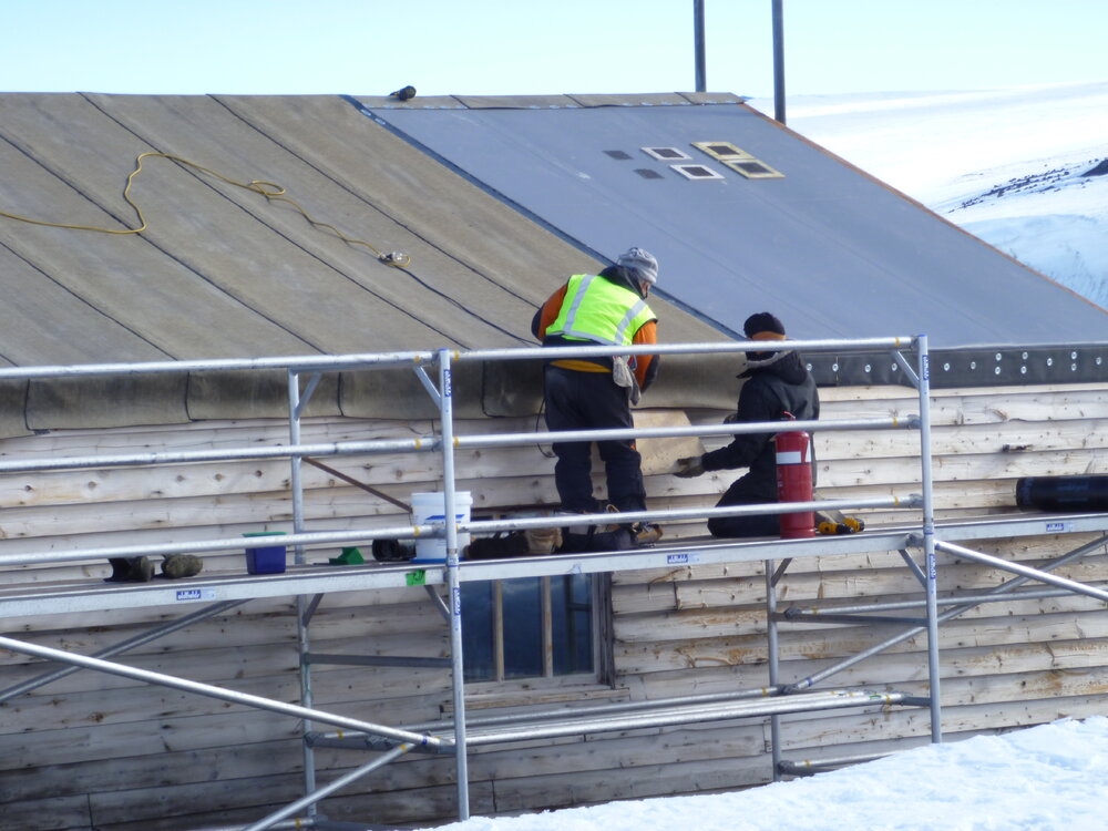 2010-11 John Taylor and Al Fastier installing new roof cladding, Cape Evans
