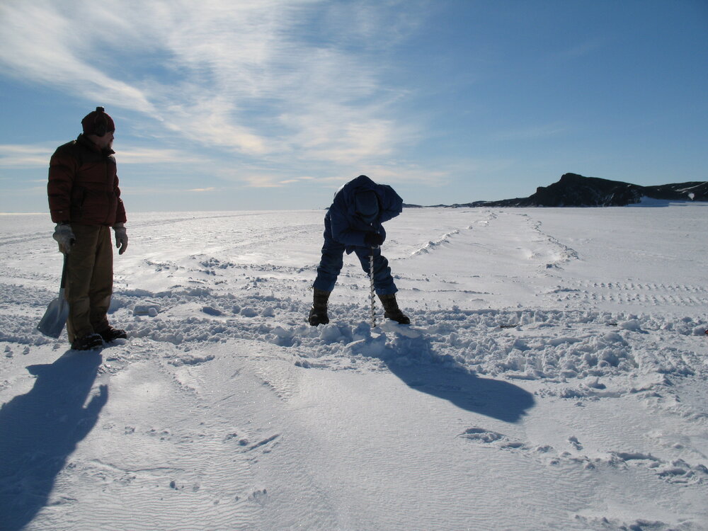 Measuring ice depth (004)