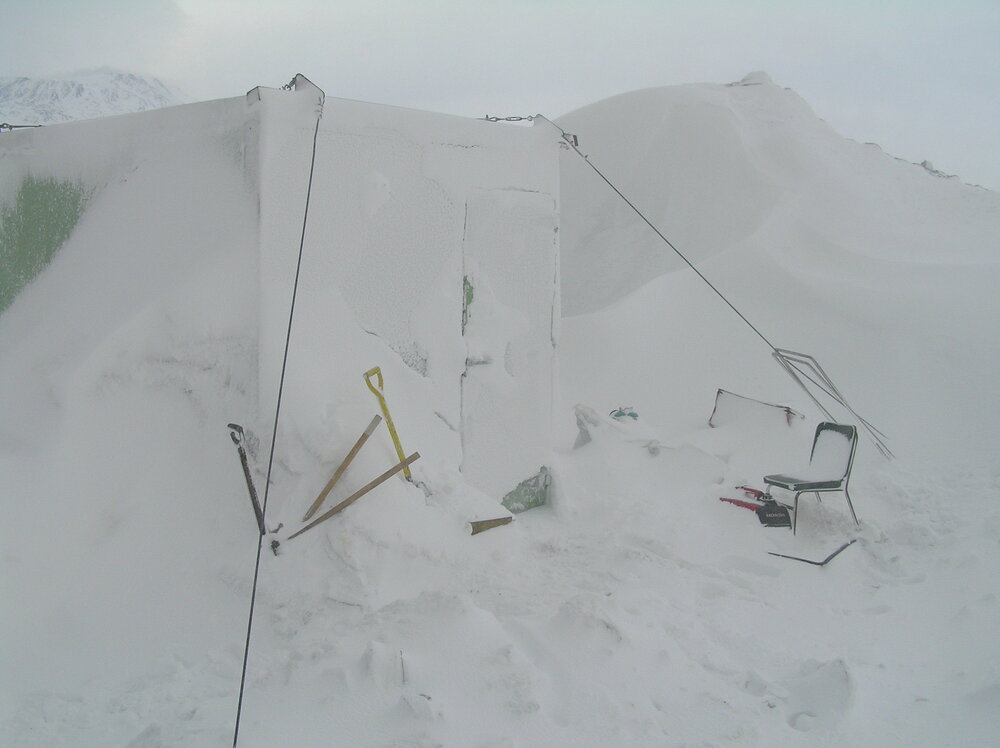 Snow build-up at field camp site, Cape Royds