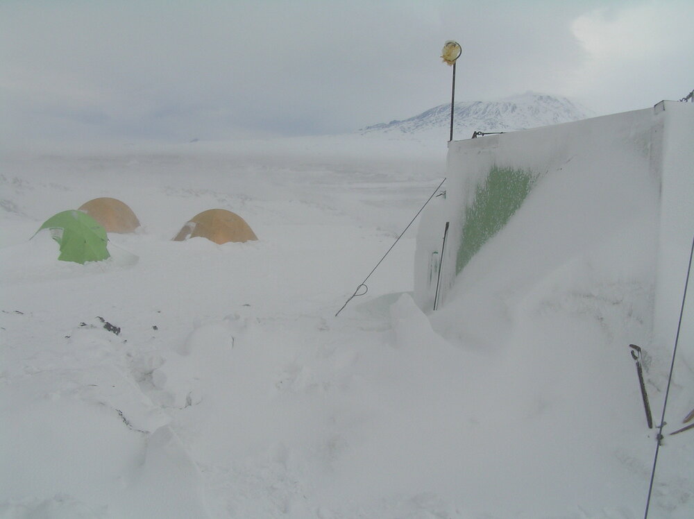 Snow build-up at field camp site, Cape Royds 