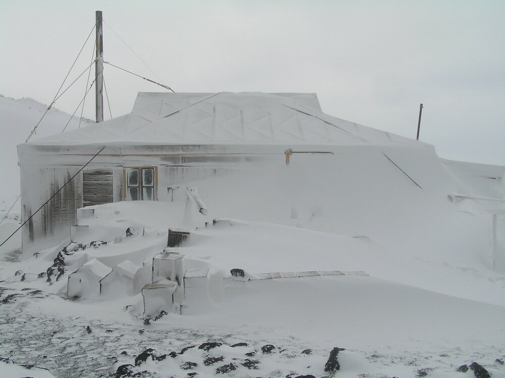 Snow build-up, north elevation of Shackleton's 'Nimrod' hut