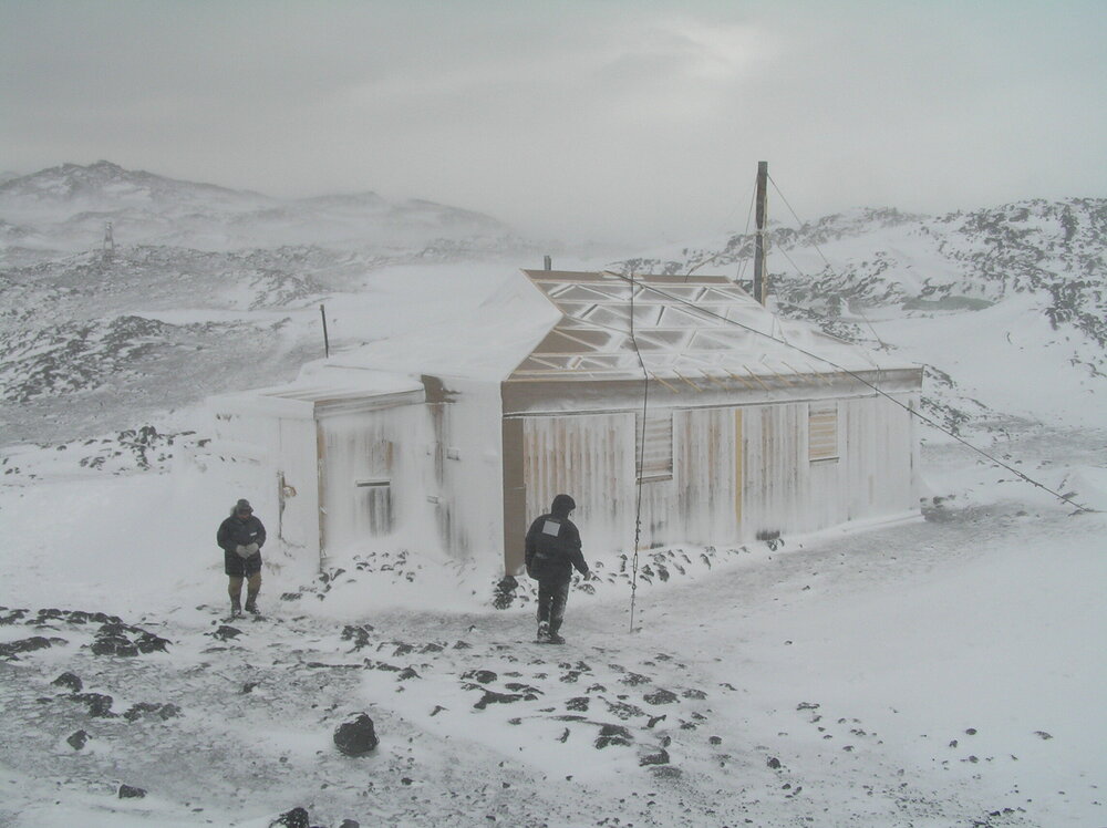 Snow build-up, southwest elevation of Shackleton's 'Nimrod' hut
