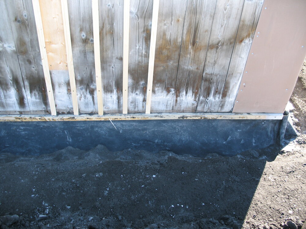 Fixed Butynol valance at base of south wall, Shackleton's 'Nimrod' hut