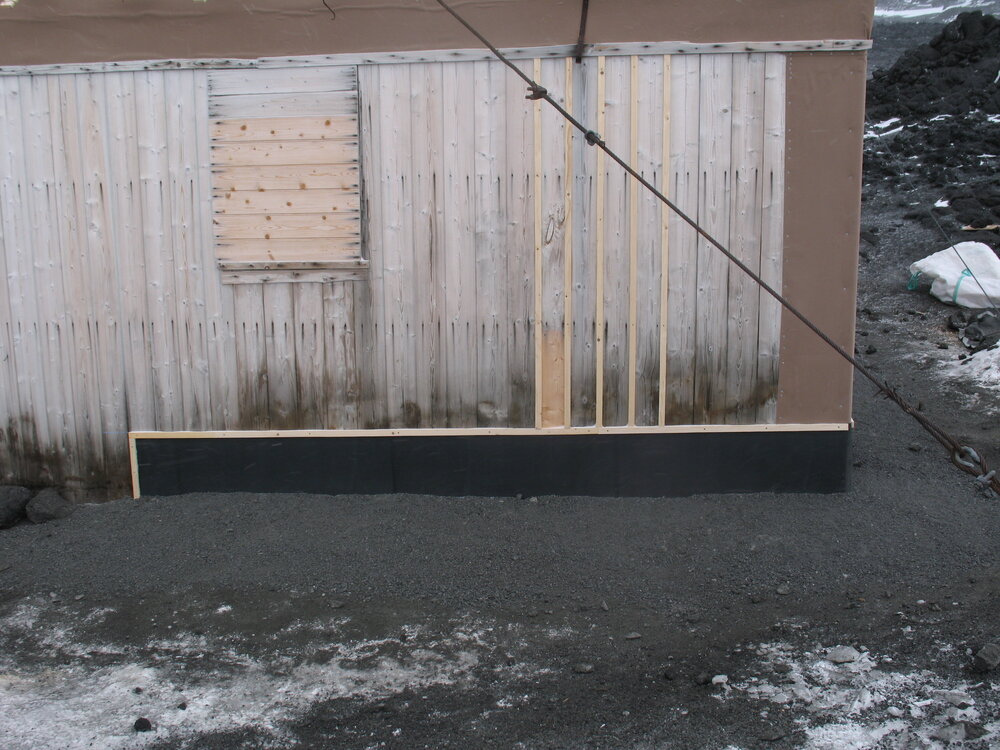Fixed Butynol valance at base of south wall, Shackleton's 'Nimrod' hut