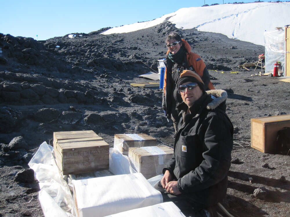 2010-11 John Taylor and Lizzie Meek wrapping whisky boxes, Cape Royds 