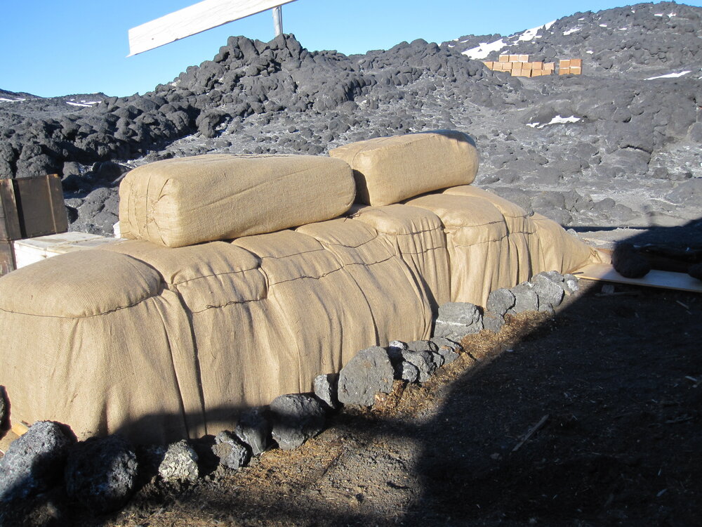 2010-11 Fodder bales stacked outside Shackleton's 'Nimrod' hut