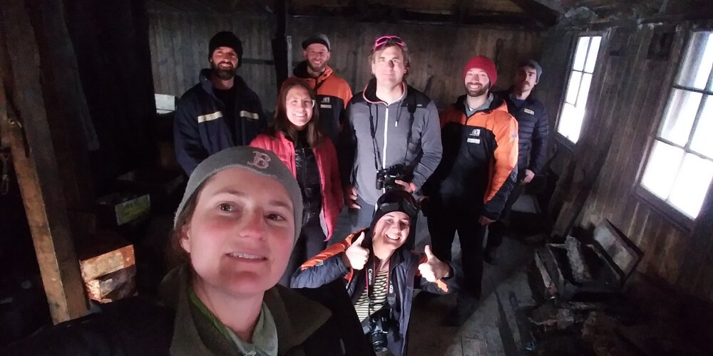 Sarah Bouckoms leads a tour inside Scott's 'Discovery' hut