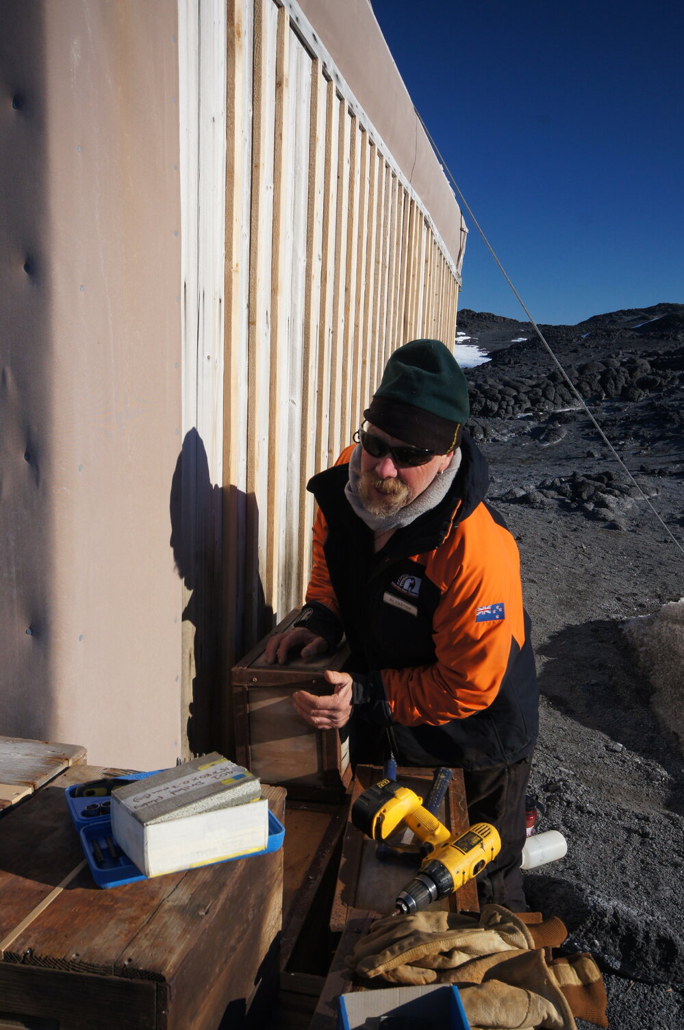 Reinstalling Venesta cases, Shackleton's 'Nimrod' hut (002)