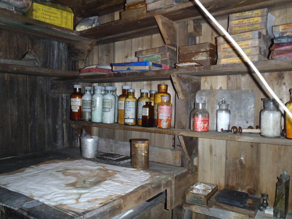 2010-11 Photographic supplies on the shelves within the Darkroom, Cape Evans