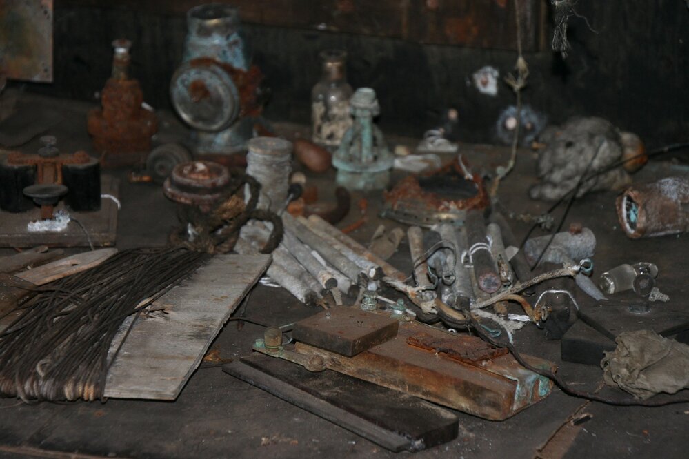 2010-11 Artefacts on the table outside the Darkroom door, Cape Evans
