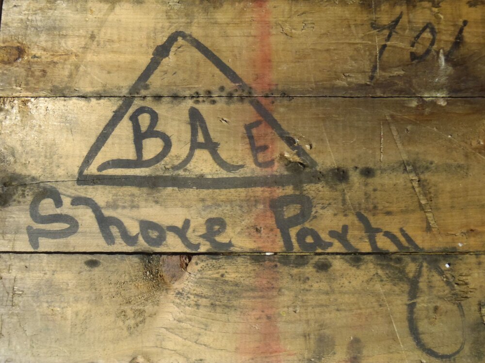 2010-11 "BAE Shore Party"  written on a box, Cape Evans